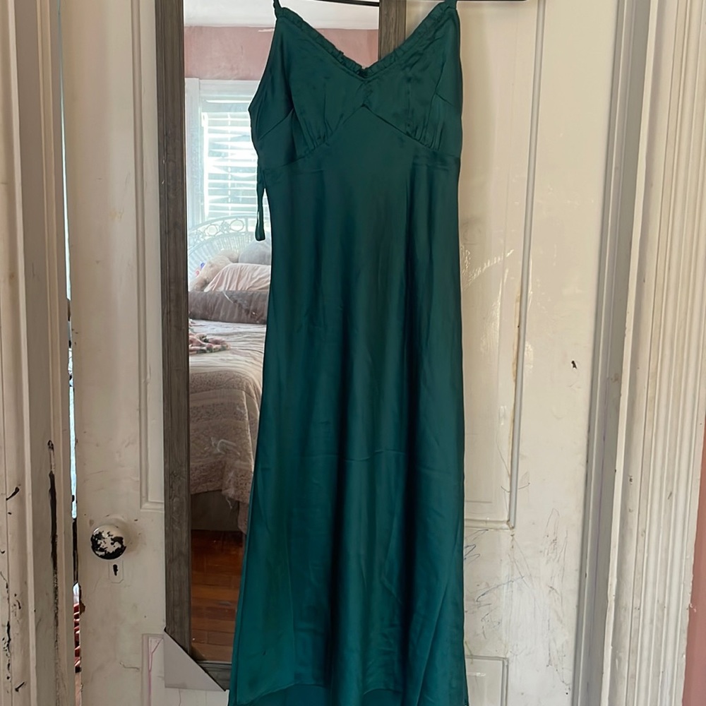 Women’s green dress with slit